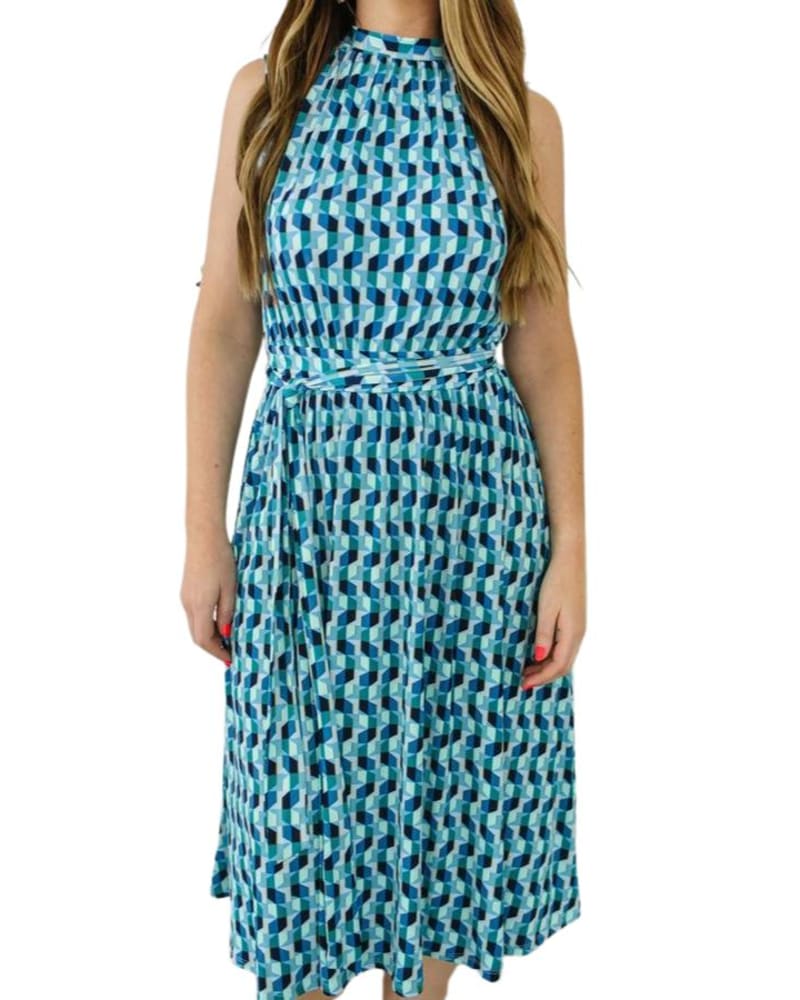 Front of a model wearing a size L Mindy Shirred Midi Dress in Mod Geo in Mod Geo by Leota. | dia_product_style_image_id:346342